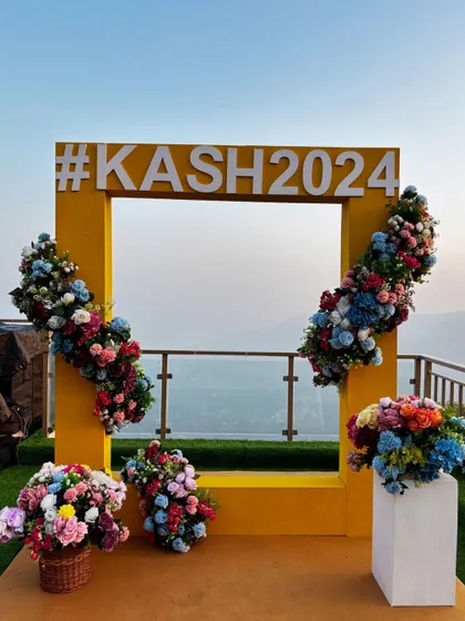 We love adding personal touches that make your event uniquely yours. This custom-made selfie booth with the couple's wedding hashtag became a huge hit, offering guests a fun spot to capture memories against a stunning scenic backdrop.