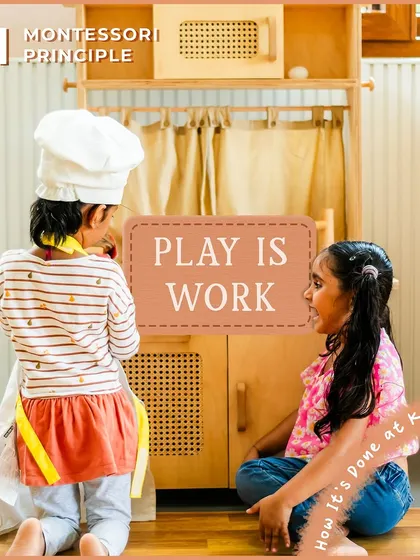 Play is the work of the child. Here, two children are engaged in role play in our kitchen corner, developing social skills, language, and imagination.