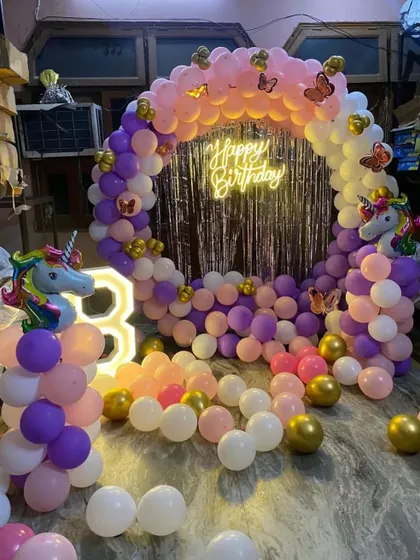 A wider view of the unicorn and butterfly decoration.