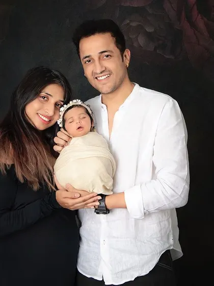 The classic first family photo. I will guide you into a comfortable pose to capture that perfect portrait of you and your partner holding your precious new baby.