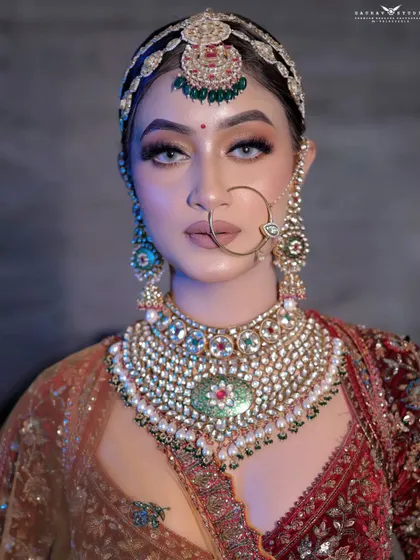 A powerful and direct close-up portrait. The bride's striking eyes and confident expression are perfectly captured, making for a memorable and impactful image.