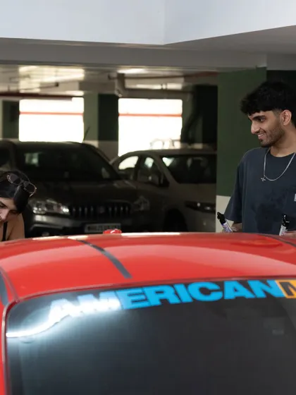 Another view of the teamwork it took to bring this custom car art to life.