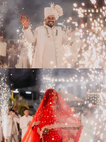 The grand entry of the bride and groom, walking hand in hand through an aisle of cold pyros, ready to start their new life together.