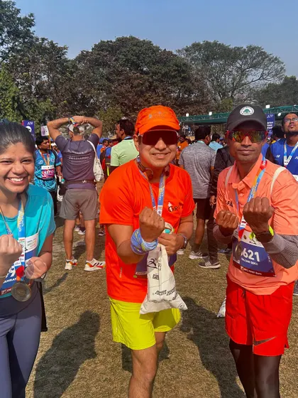 Three of our runners celebrating their finish at the Tata Steel 25K Kolkata.