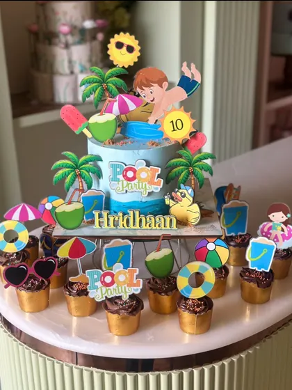 Pool vibes, but make it cake! Our summer-themed cakes bring the sunshine to your party, with designs featuring beach scenes, ocean waves, and fun caravan toppers.