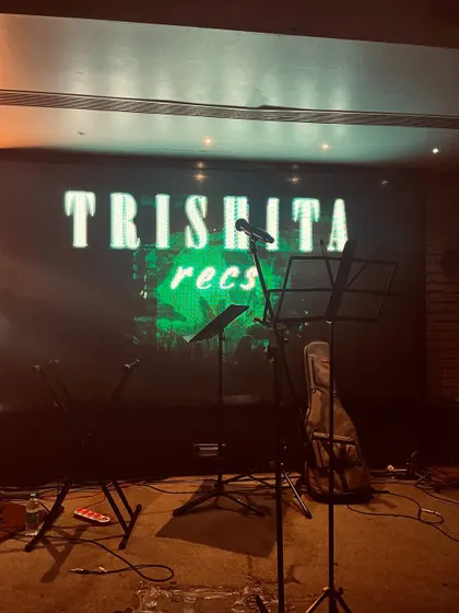 The stage is set with my name in lights. This is a great branding shot that shows the professional setup for my solo shows.