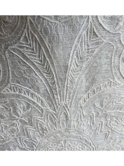 This richly detailed and intricately embroidered cloth is reminiscent of the ornate style of the Victorian era. It's a perfect example of the kind of heritage-quality textiles I source for special projects.