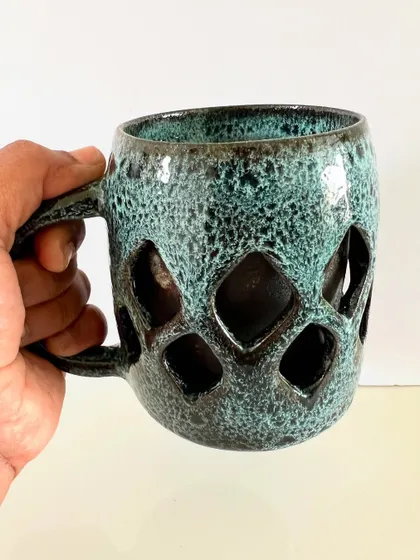 The way this mug fits in the hand shows how functional and ergonomic handmade pottery can be.
