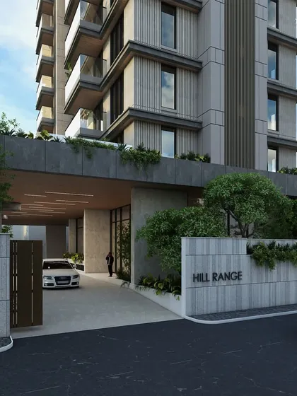 The entrance to our 'Hill Range' residence in Bandra. The design uses clean lines, natural stone, and climbing greenery to create a minimalist yet sophisticated welcome, setting a tone of understated luxury.