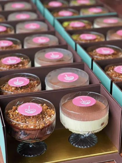 Inside the Ganga Realty corporate gift boxes. Each box contained a duo of our popular dessert cups: the rich Chocolate Salted Caramel Trifle and the timeless Classic Tiramisu, providing a delicious experience for their recipients.