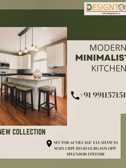 A modern minimalist kitchen with a large island that doubles as a breakfast bar. The design uses a neutral color palette and natural wood floors to create a warm and inviting atmosphere.