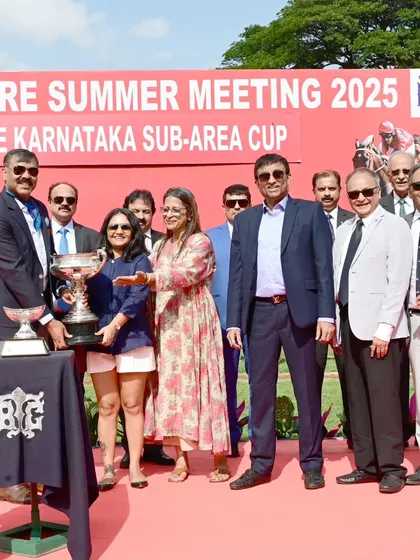 Maj. Gen. VT Mathew presents The Karnataka Sub-Area Cup to the owners of Trakila.