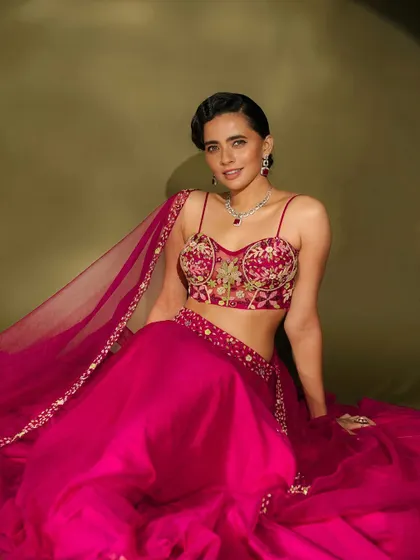 A happy and confident shot. The makeup is designed to make the client feel like the best version of themselves, whether it's for a wedding or a fashion shoot.