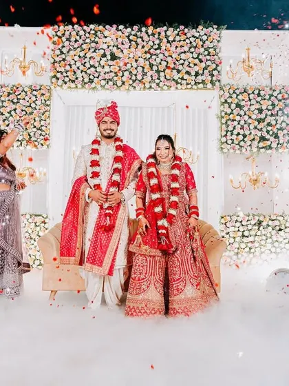 The Varmala ceremony on a stage floating on a cloud of dry ice, creating a truly magical and unforgettable moment.