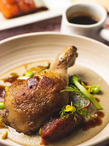 A beautifully roasted chicken leg, part of my special Thanksgiving menu. It's classic comfort food with a gourmet twist.