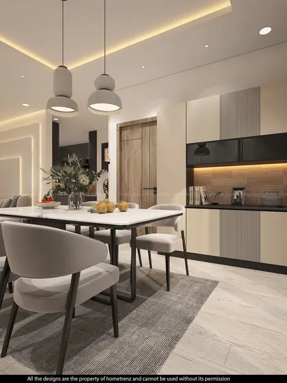 This dining area features a sleek crockery unit with two-tone cabinets and a wooden backsplash, providing ample storage for dinnerware.