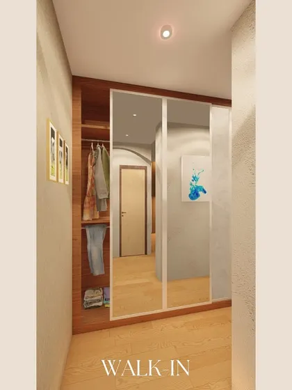 A glimpse into a compact yet functional walk-in closet. I used a large mirror on the sliding door to create an illusion of spaciousness while providing practical, open shelving for easy access to clothes.