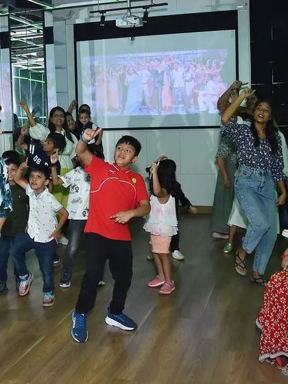 Moments from a high-energy dance party and workshop for kids. These events are full of fun, learning basic choreography, and enjoying dance in a group.