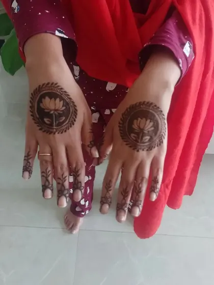 Another view of the custom lotus mandala design, showing the clean lines and simple finger details.