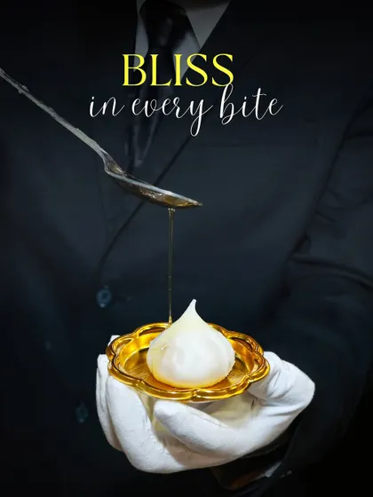 I believe in honoring tradition with elegance. Here, a handcrafted Ukadiche Modak, a revered Maharashtrian sweet, is being anointed with golden ghee, showcasing the care and respect I put into every classic dish.