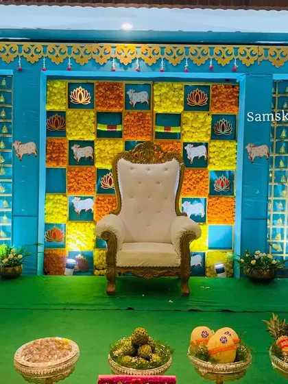 A full view of our colorful sheep and lotus themed stage. The bright blue frame and checkerboard floral pattern create a joyful and festive atmosphere.