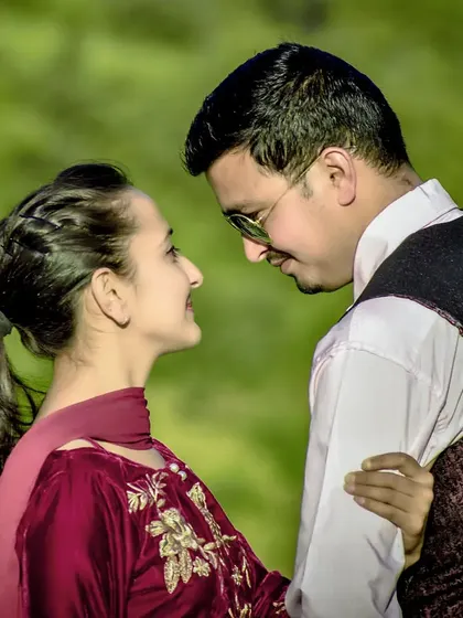 An intimate close-up from a pre-wedding shoot. The focus on their expressions and the connection between them makes this a powerful, romantic photo.