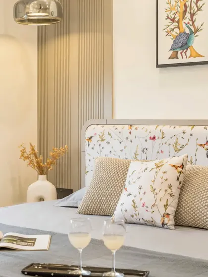 A minimal bed with a floral cushion headboard, providing a perfect mix of style and function with its under-bed storage.