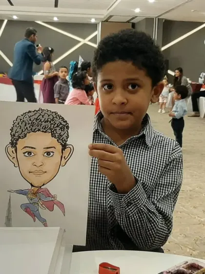 Every kid wants to be a superhero! I love creating themed caricatures like this one, turning a young guest into Superman for a fun and empowering birthday party souvenir.