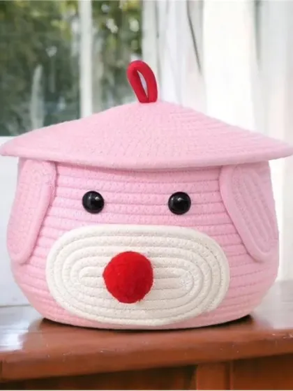 This pink teddy dog basket is a sweet and charming choice for a nursery or little girl's room. It's as cute as it is practical.