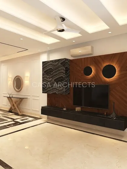 This visualization of a living room highlights a unique TV wall with a mix of wood and stone textures and backlit circular cutouts for a modern, artistic look.