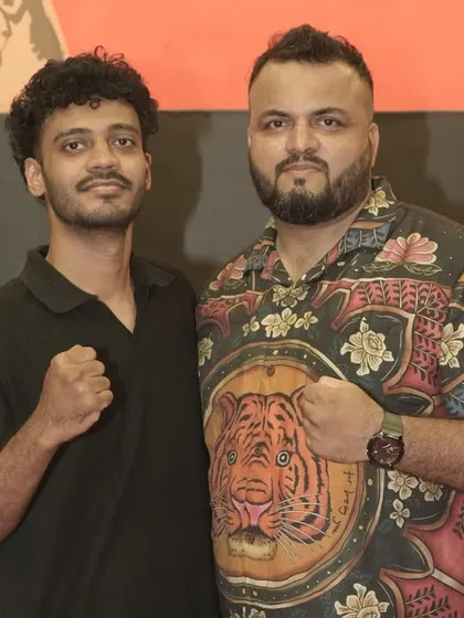 Me with another one of our dedicated fighters. The mutual respect and camaraderie are what make our team strong.