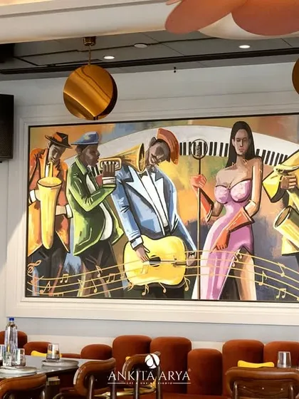 This view shows how the jazz mural integrates with the restaurant's seating, becoming an integral part of the dining atmosphere.