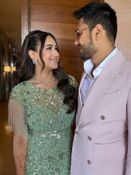 A lovely couple portrait from the Welcome Lunch. The bride's soft, natural makeup looks beautiful next to her partner, creating a harmonious and picture-perfect moment.