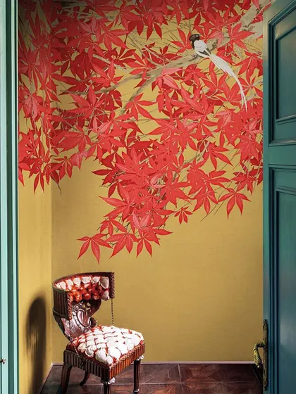 This corner features a stunning artistic wall painting. Such elements can calm your mind and add a unique, personal touch to any drawing room or entryway.