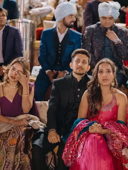 The emotional reactions of guests watching the wedding ceremony. I am always observing the crowd to capture these heartfelt, secondary stories.