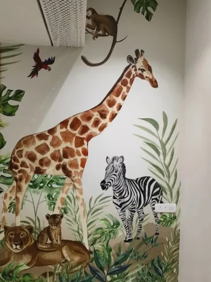 A vibrant jungle scene with giraffes, zebras, and monkeys, creating a fun and engaging environment for a child's room.