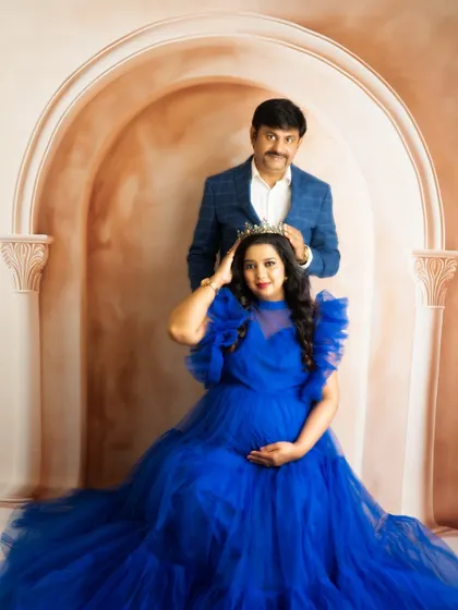A slight variation of the crowning pose, capturing a different angle and expression for a complete set of royal-themed portraits.