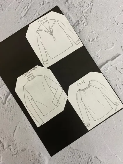 Flat sketches of various blouse types, such as a sailor top and a gypsy blouse.