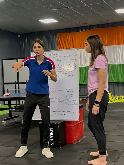 A coach explains a self defense principle during a workshop. We focus on teaching awareness and simple, effective movements that anyone can use, regardless of their size or strength.