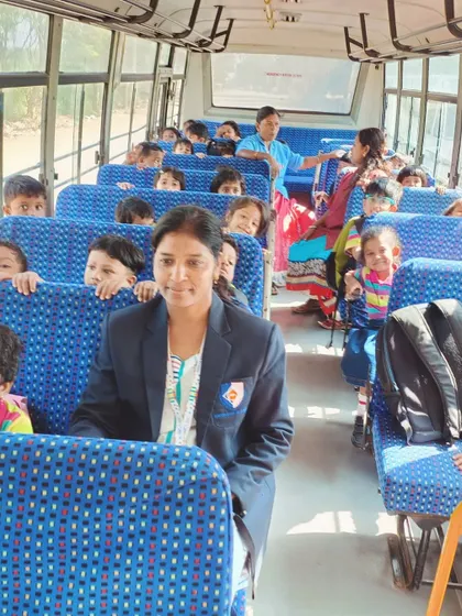 The excitement is visible on the bus as our students head out for their post office field trip.