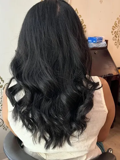 The back view of Shruthi's beautiful layered cut.