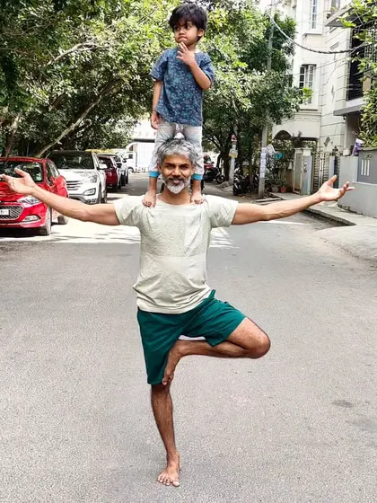 Yoga is for everyone in the family. Sharing my practice with my son is one of my greatest joys. Here, we find balance together in Vrikshasana, or Tree Pose, turning a classic asana into a moment of connection and playfulness.
