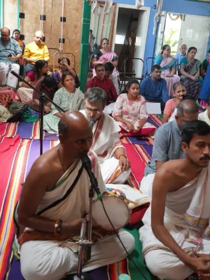 Participants and priests gathered for the Rudraabhishekham, creating a collective atmosphere of devotion and peace.