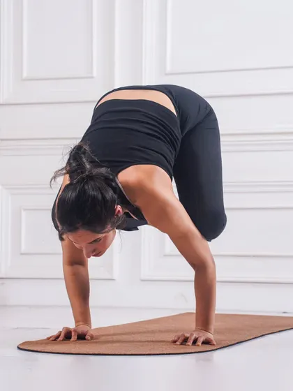 Holding Kakasana. The key is to shift your weight forward, engage your core, and gaze ahead. It's a powerful lesson in finding your center of gravity.