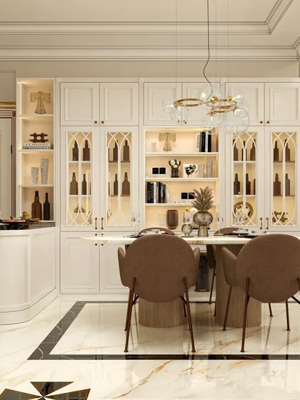 An expansive dining and crockery unit in a neoclassical style. Glass-fronted cabinets with internal lighting beautifully display dinnerware, while the marble flooring with black inlay adds a touch of grandeur.