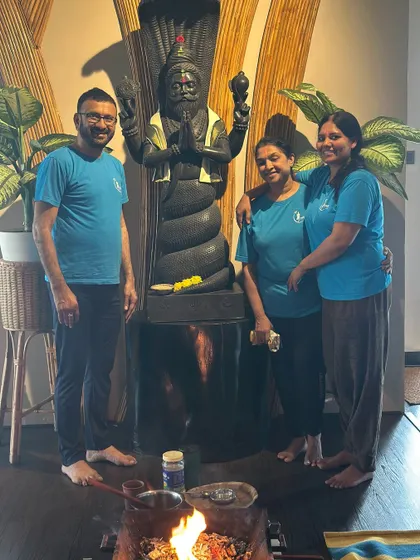 A moment from our Holi celebration, standing before the statue of Maharishi Patanjali. The havan fire in the foreground symbolizes the transformative power of our spiritual practices.