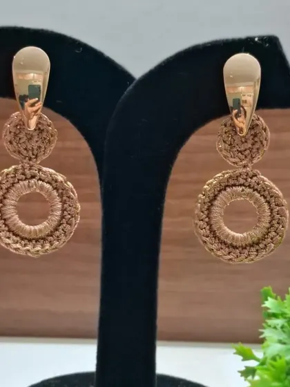 These two-tiered drop earrings in a lovely brown shade are a perfect example of our elegant, lightweight designs. They offer a bit of movement and a lot of style.