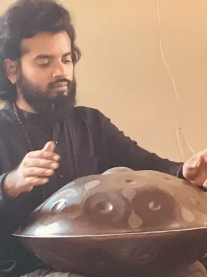 Playing the handpan for a mixed-age audience.