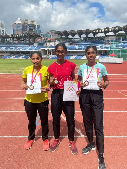 Our girls' 4x100m relay team with their bronze medals from the Dasara Meet. Team events are a fantastic way to build camaraderie.