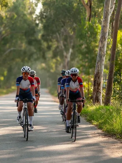 A perfect paceline on a quiet country road. Our training rides help us build endurance, practice drafting, and get stronger together as a team.